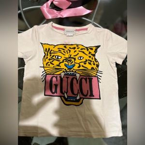 Like new kids Gucci shirt, only worn 2 times. Kids size 5